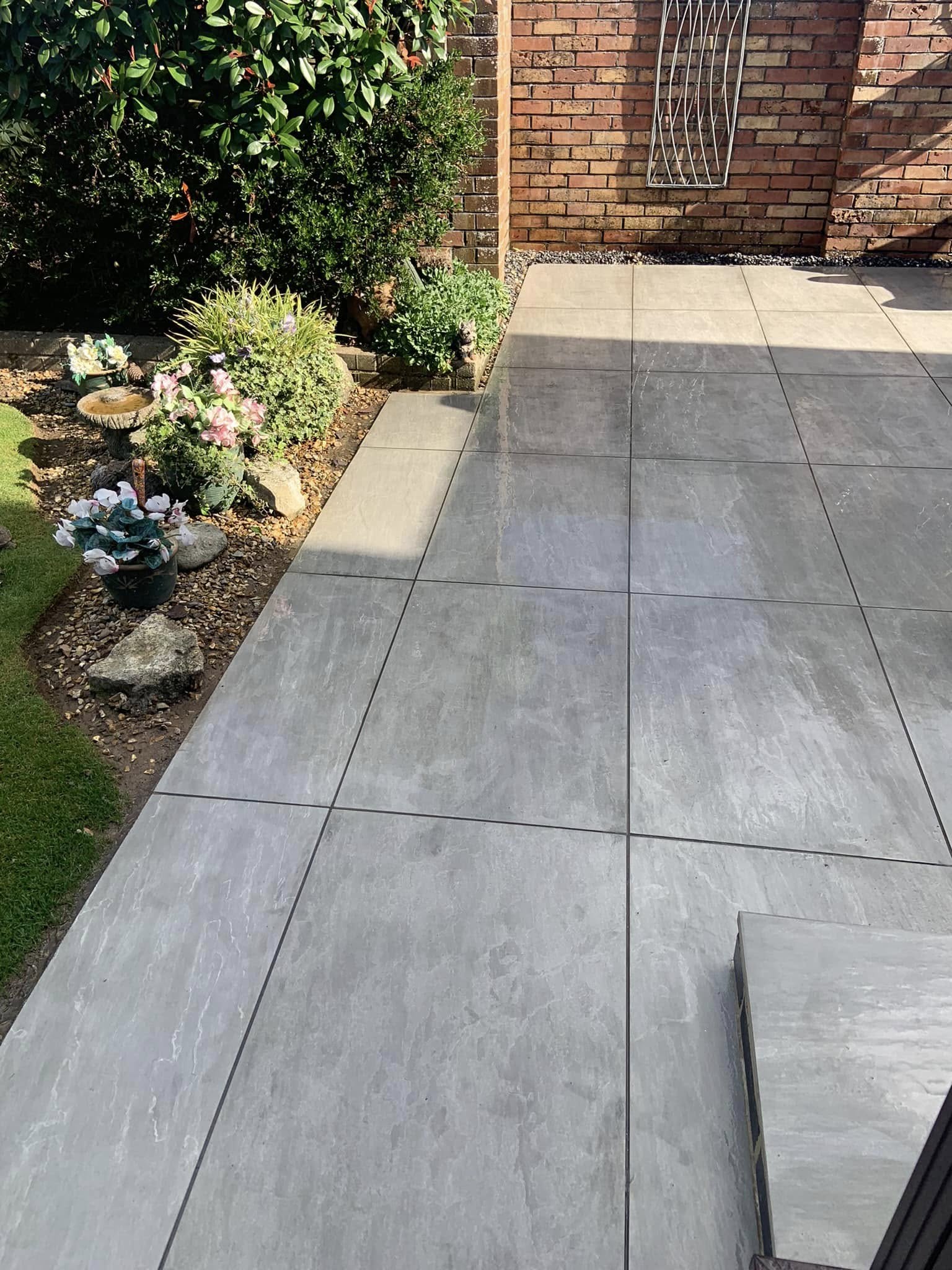 Porcelain patio with integrated pathway and steps
