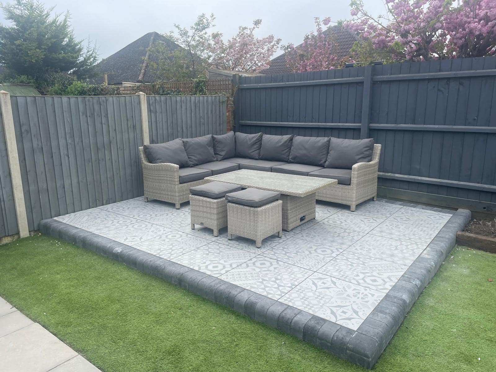 Outdoor living space with porcelain patio design